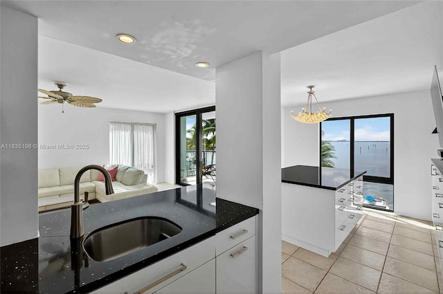 1600 S Bayshore Ln Unit 3A, Coconut Grove, FL 33133 - kitchen featuring light tile patterned flooring, white cabinets, open floor plan, ceiling fan, and recessed lighting