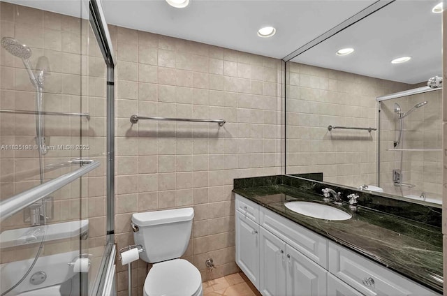 1600 S Bayshore Ln Unit 3A, Coconut Grove, FL 33133 - full bath featuring vanity, tile walls, recessed lighting, tiled shower / bath, and tile patterned floors