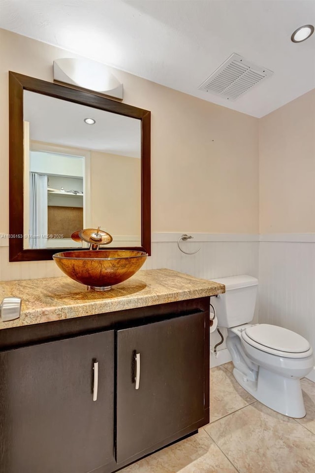 2921 SW 87th Ave Unit 511, Davie, FL 33328 - bathroom with vanity, wainscoting, and tile patterned flooring