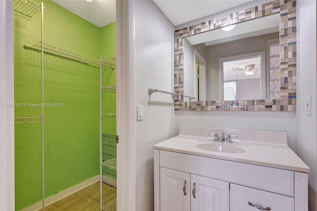 2921 SW 87th Ave Unit 511, Davie, FL 33328 - bathroom with vanity, ceiling fan, and a walk in closet