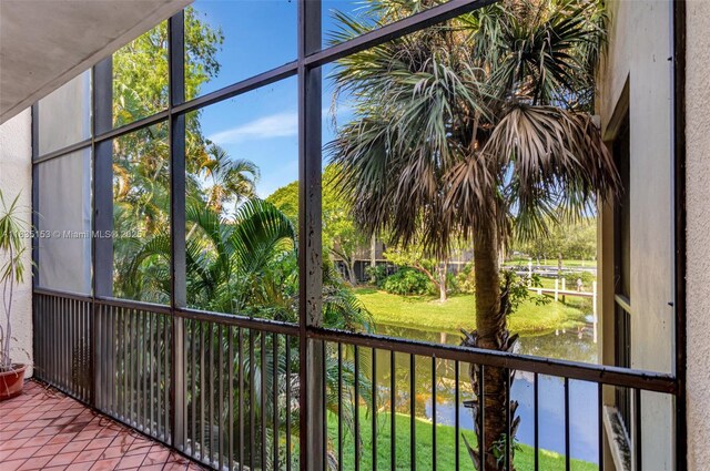 2921 SW 87th Ave Unit 511, Davie, FL 33328 - unfurnished sunroom featuring a water view