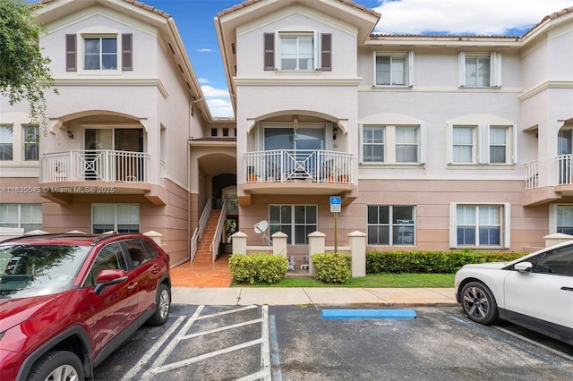 8956 W Flagler St Unit 203, Miami, FL 33174 - view of building exterior with uncovered parking