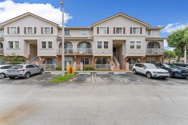 8956 W Flagler St Unit 203, Miami, FL 33174 - view of front of home with uncovered parking and stucco siding