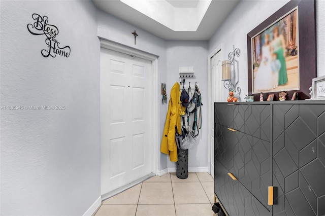 8956 W Flagler St Unit 203, Miami, FL 33174 - foyer entrance with light tile patterned floors and baseboards