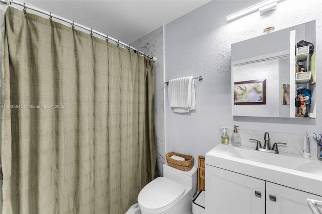8956 W Flagler St Unit 203, Miami, FL 33174 - bathroom featuring vanity, a shower with curtain, and a textured wall