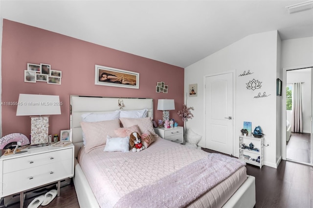 8956 W Flagler St Unit 203, Miami, FL 33174 - bedroom featuring vaulted ceiling and dark wood-type flooring