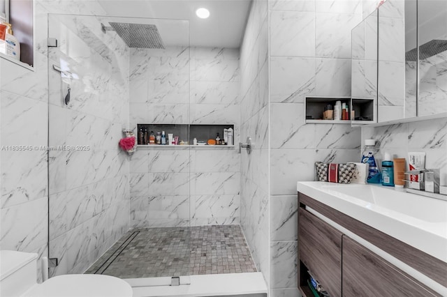 8956 W Flagler St Unit 203, Miami, FL 33174 - bathroom with tile walls, tiled shower, vanity, and recessed lighting