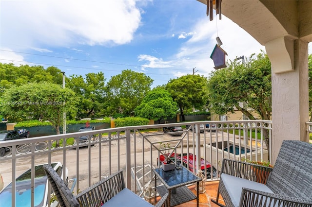 8956 W Flagler St Unit 203, Miami, FL 33174 - balcony featuring view of wooded area