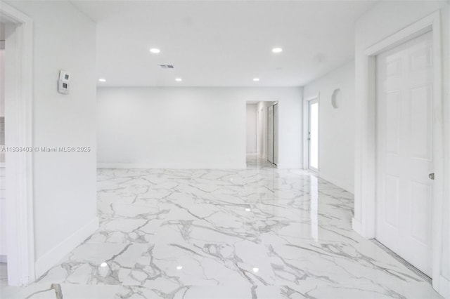 6541 SW 8th St, North Lauderdale, FL 33068 - empty room with light marble finish floors and recessed lighting
