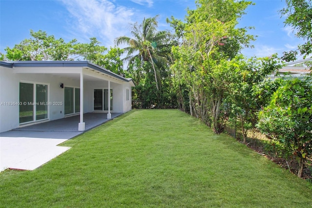 6541 SW 8th St, North Lauderdale, FL 33068 - view of green lawn featuring a patio area