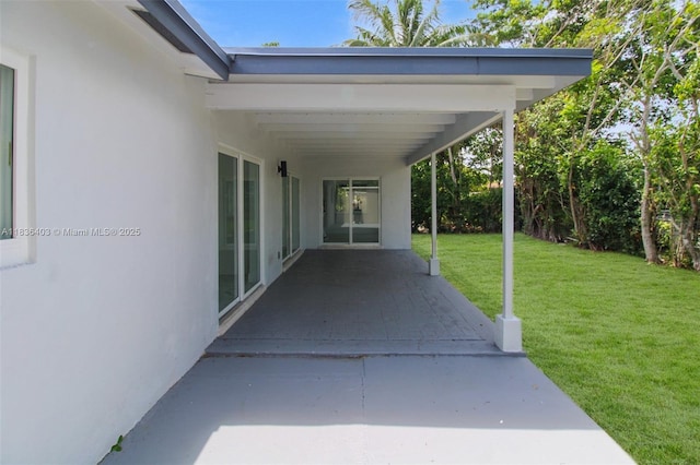 6541 SW 8th St, North Lauderdale, FL 33068 - view of patio / terrace with a carport
