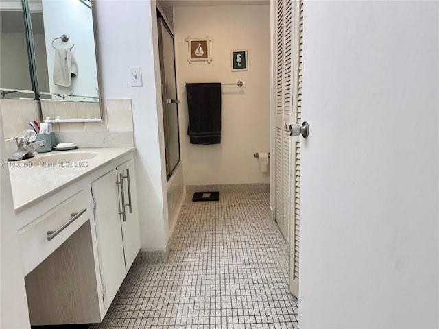 210 174th St Unit 1215, Sunny Isles Beach, FL 33160 - full bath with a closet, vanity, and enclosed tub / shower combo