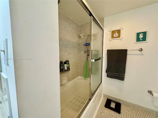 210 174th St Unit 1215, Sunny Isles Beach, FL 33160 - bathroom with combined bath / shower with glass door