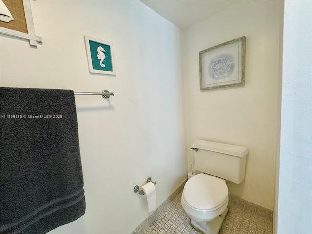 210 174th St Unit 1215, Sunny Isles Beach, FL 33160 - bathroom featuring toilet and baseboards