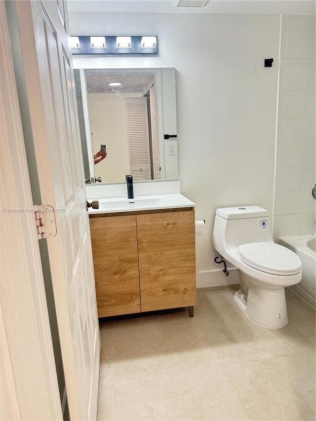 7900 NW 6th St Unit 102, Pembroke Pines, FL 33024 - bathroom featuring vanity, tile patterned floors, and shower / washtub combination