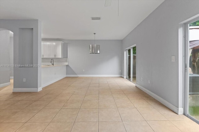 12720 SW 49th Ct, Miramar, FL 33027 - unfurnished room featuring light tile patterned flooring and arched walkways