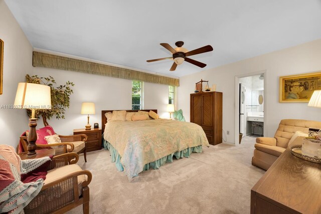 15340 SW 82nd Ave, Palmetto Bay, FL 33157 - bedroom with light carpet, a ceiling fan, and ensuite bath