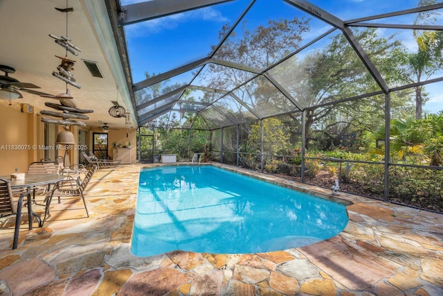 15340 SW 82nd Ave, Palmetto Bay, FL 33157 - swimming pool featuring a patio area, a ceiling fan, and a lanai