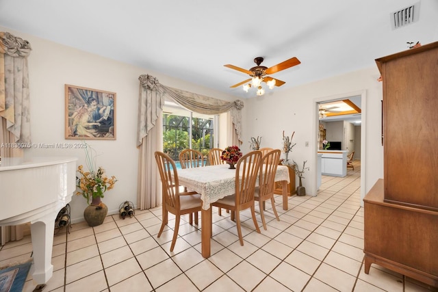 15340 SW 82nd Ave, Palmetto Bay, FL 33157 - dining space featuring light tile patterned flooring and ceiling fan