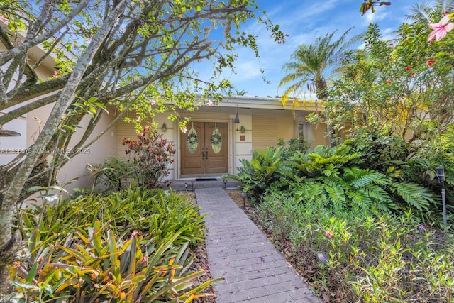 15340 SW 82nd Ave, Palmetto Bay, FL 33157 - doorway to property with stucco siding
