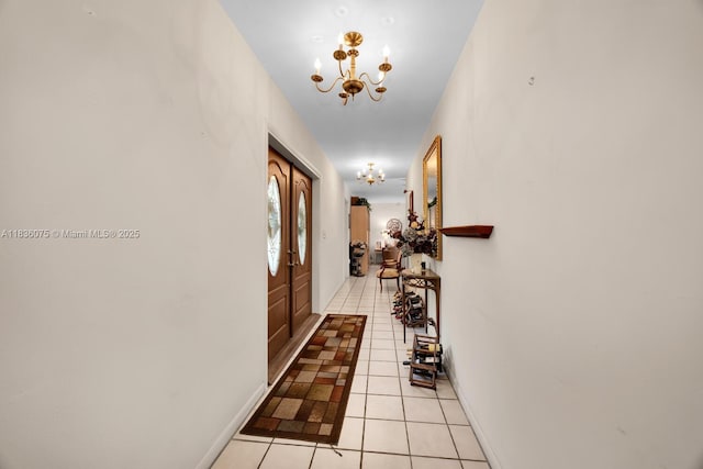 15340 SW 82nd Ave, Palmetto Bay, FL 33157 - corridor featuring a chandelier and light tile patterned floors