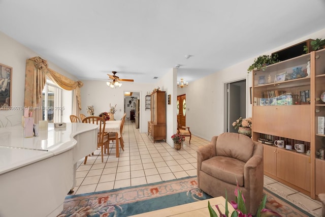 15340 SW 82nd Ave, Palmetto Bay, FL 33157 - living area featuring light tile patterned flooring and a ceiling fan