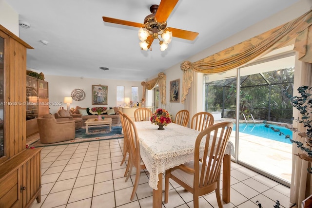 15340 SW 82nd Ave, Palmetto Bay, FL 33157 - dining area with light tile patterned flooring and ceiling fan