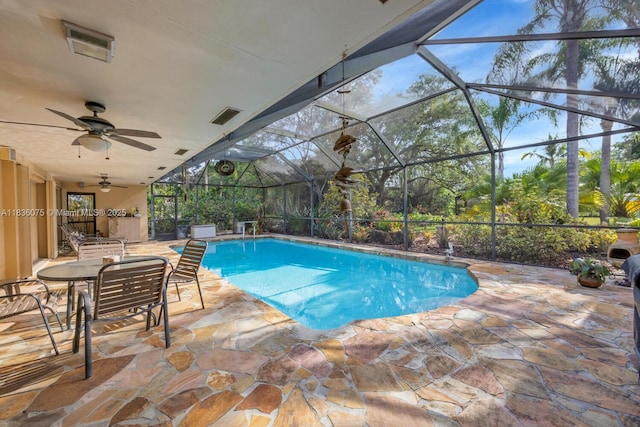 15340 SW 82nd Ave, Palmetto Bay, FL 33157 - swimming pool with a patio, ceiling fan, and a lanai