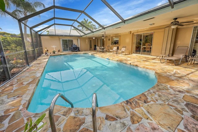 15340 SW 82nd Ave, Palmetto Bay, FL 33157 - outdoor pool with ceiling fan, a patio area, and glass enclosure