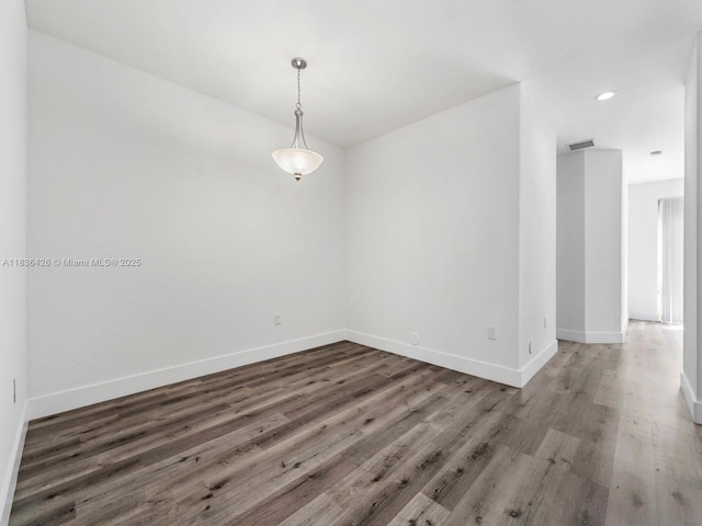 1456 SE 26th Ave, Homestead, FL 33035 - empty room featuring wood finished floors and recessed lighting