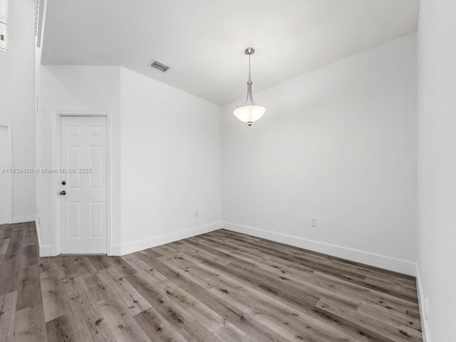 1456 SE 26th Ave, Homestead, FL 33035 - spare room with wood finished floors and baseboards