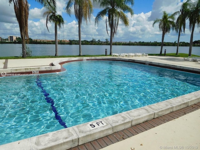 323 Ives Dairy Rd Unit 323-06, Miami, FL 33179 - community pool featuring a water view