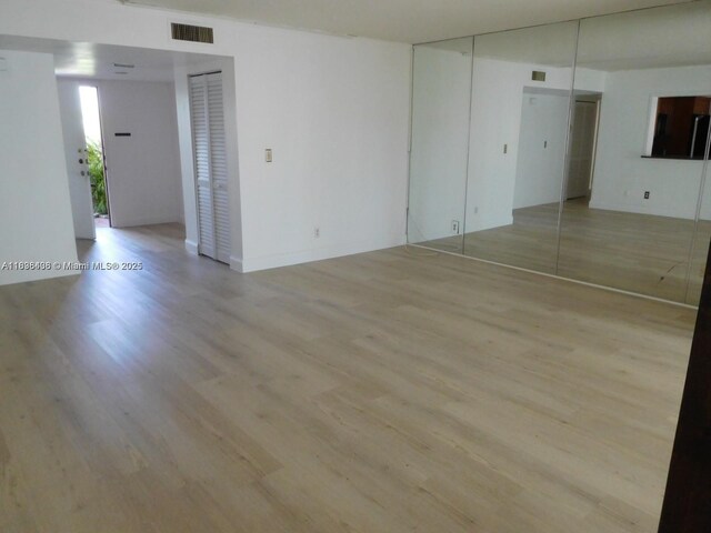 323 Ives Dairy Rd Unit 323-06, Miami, FL 33179 - empty room featuring light wood-style flooring