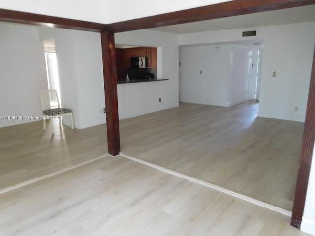 323 Ives Dairy Rd Unit 323-06, Miami, FL 33179 - unfurnished living room with light wood-type flooring
