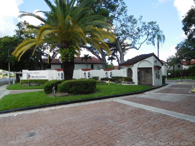 323 Ives Dairy Rd Unit 323-06, Miami, FL 33179 - view of front of house with stucco siding