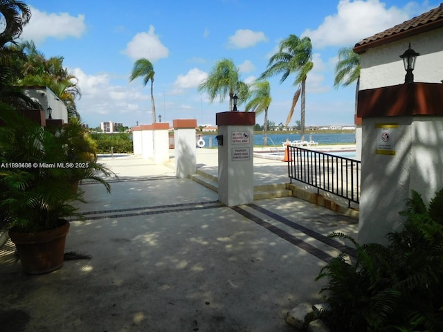 323 Ives Dairy Rd Unit 323-06, Miami, FL 33179 - gate with a water view