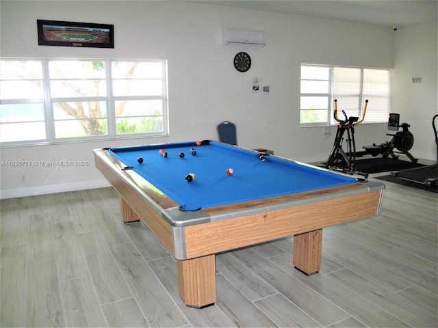 14529 Canalview Dr Unit B, Delray Beach, FL 33484 - rec room with a wall mounted AC, billiards table, and light wood-style floors