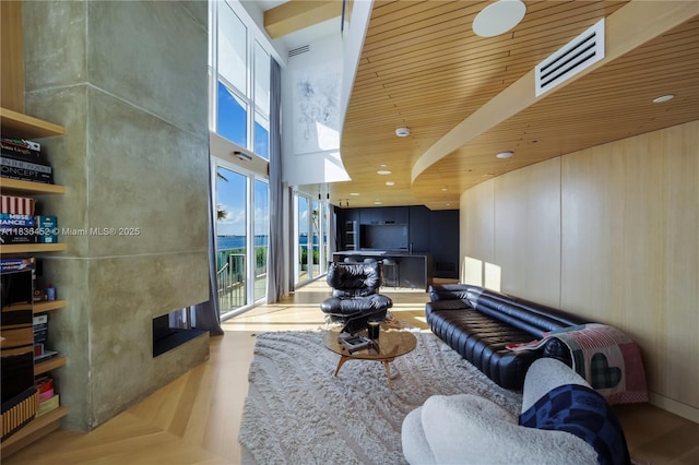 1331 Brickell Bay Dr Unit Bl-21, Miami, FL 33131 - living area with a tile fireplace and a towering ceiling