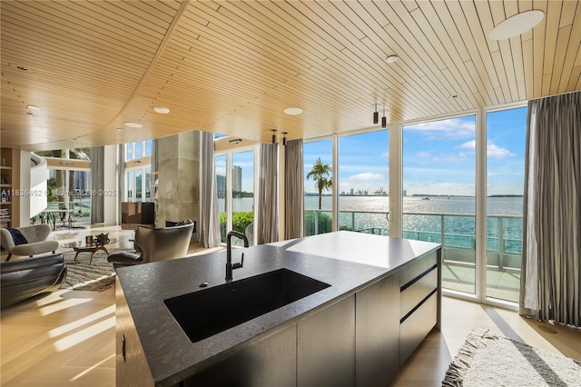 1331 Brickell Bay Dr Unit Bl-21, Miami, FL 33131 - kitchen featuring a water view, wood ceiling, floor to ceiling windows, open floor plan, and modern cabinets
