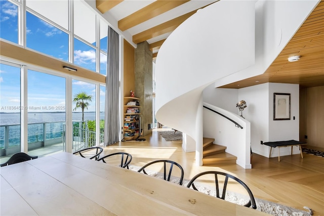 1331 Brickell Bay Dr Unit Bl-21, Miami, FL 33131 - dining area featuring a high ceiling, a water view, and stairway