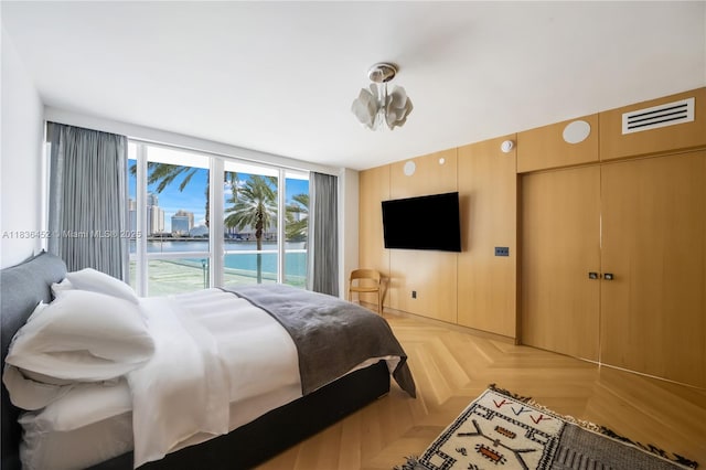 1331 Brickell Bay Dr Unit Bl-21, Miami, FL 33131 - bedroom with access to exterior and floor to ceiling windows