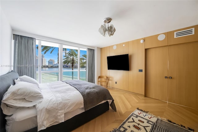 1331 Brickell Bay Dr Unit Bl-21, Miami, FL 33131 - bedroom with access to outside and floor to ceiling windows