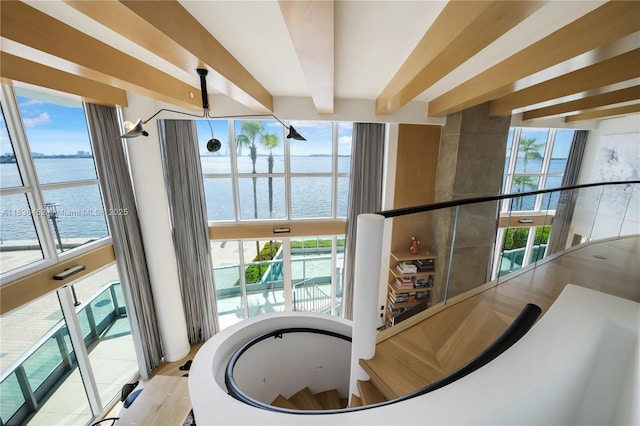 1331 Brickell Bay Dr Unit Bl-21, Miami, FL 33131 - stairway featuring a water view and plenty of natural light