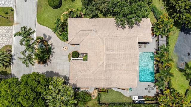 9099 NW 47th Ct, Coral Springs, FL 33067 - view of subject property featuring a pool