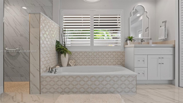 9099 NW 47th Ct, Coral Springs, FL 33067 - bathroom with a bath, vanity, a marble finish shower, and marble look tile flooring