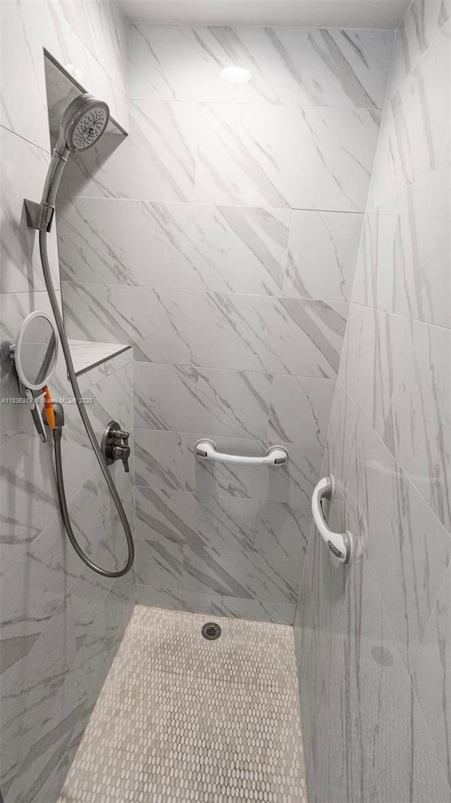 9099 NW 47th Ct, Coral Springs, FL 33067 - bathroom featuring a tile shower
