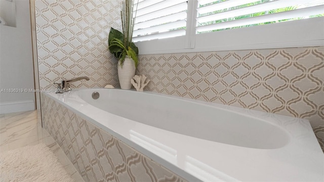9099 NW 47th Ct, Coral Springs, FL 33067 - bathroom with a bath and marble finish floors