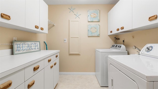 9099 NW 47th Ct, Coral Springs, FL 33067 - washroom with cabinet space and separate washer and dryer