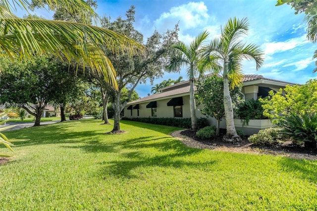 9099 NW 47th Ct, Coral Springs, FL 33067 - view of grassy yard