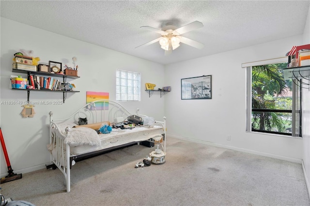 8250 NW 51st Ct, Lauderhill, FL 33351 - bedroom featuring multiple windows, carpet, a textured ceiling, and a ceiling fan